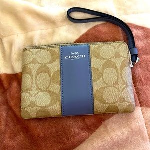 Two tone fabric and leather coach signature logo wristlet tan and purple